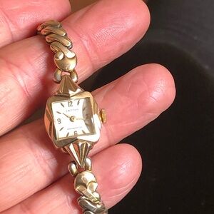 Croton Women's Gold and Silver Watch